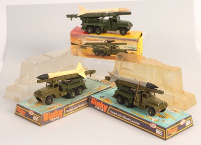 Lot 376 - Dinky Toys 3 x 665 International Harvester M386 6x6 Honest John Missile Launcher
