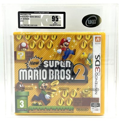 Lot 56 - Nintendo 3DS New Super Mario Bros 2 UK Version 2012 - UKG Graded 95 Mint Gold Uncirculated