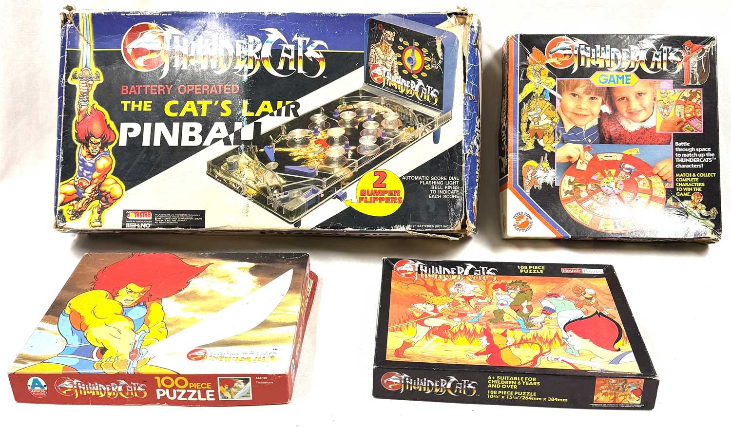 Lot 245 - Thundercats vintage 1980's Pinball Machine, Games and Puzzles x 4