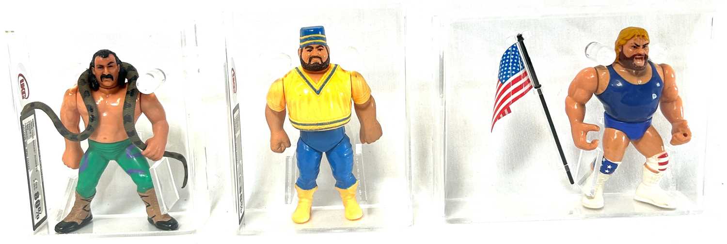 Lot 94 - Hasbro WWF UKG Graded figures x 3 Akeem, Jake the Snake Roberts and Hacksaw Jim Duggan