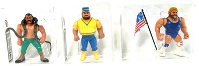 Lot 94 - Hasbro WWF UKG Graded figures x 3 Akeem, Jake the Snake Roberts and Hacksaw Jim Duggan