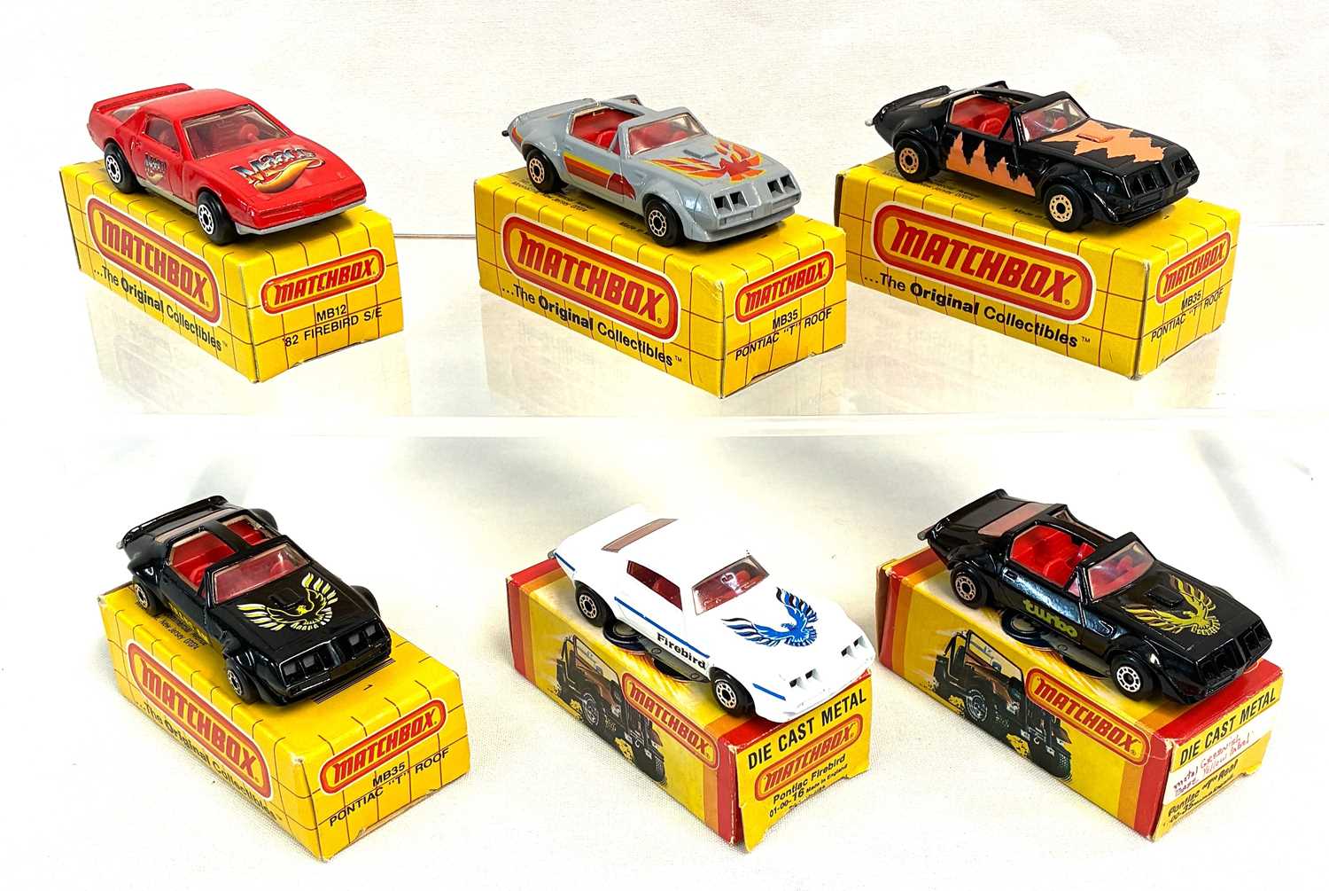 Lot 63 - Matchbox Superfast Group of 6 England & Macau Pontiac Firebird Cars.