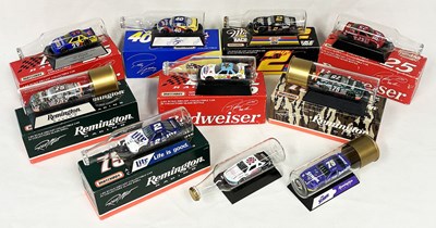 Lot 208 - Matchbox Superfast - Group of NASCAR Cars Contained in Glass Bottles & Shotgun Cartridge
