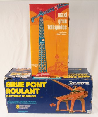 Lot 5 - Joustra & Jouets Mont Blanc. Pair of battery operated plastic cranes.