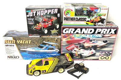 Lot 106 - Scalextric, RC Cars & Boat - Small Group.