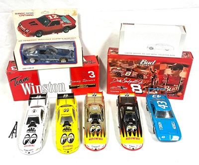 Lot 334 - Selection of Die-cast Racing Cars, Dragsters and Transporters some MIB